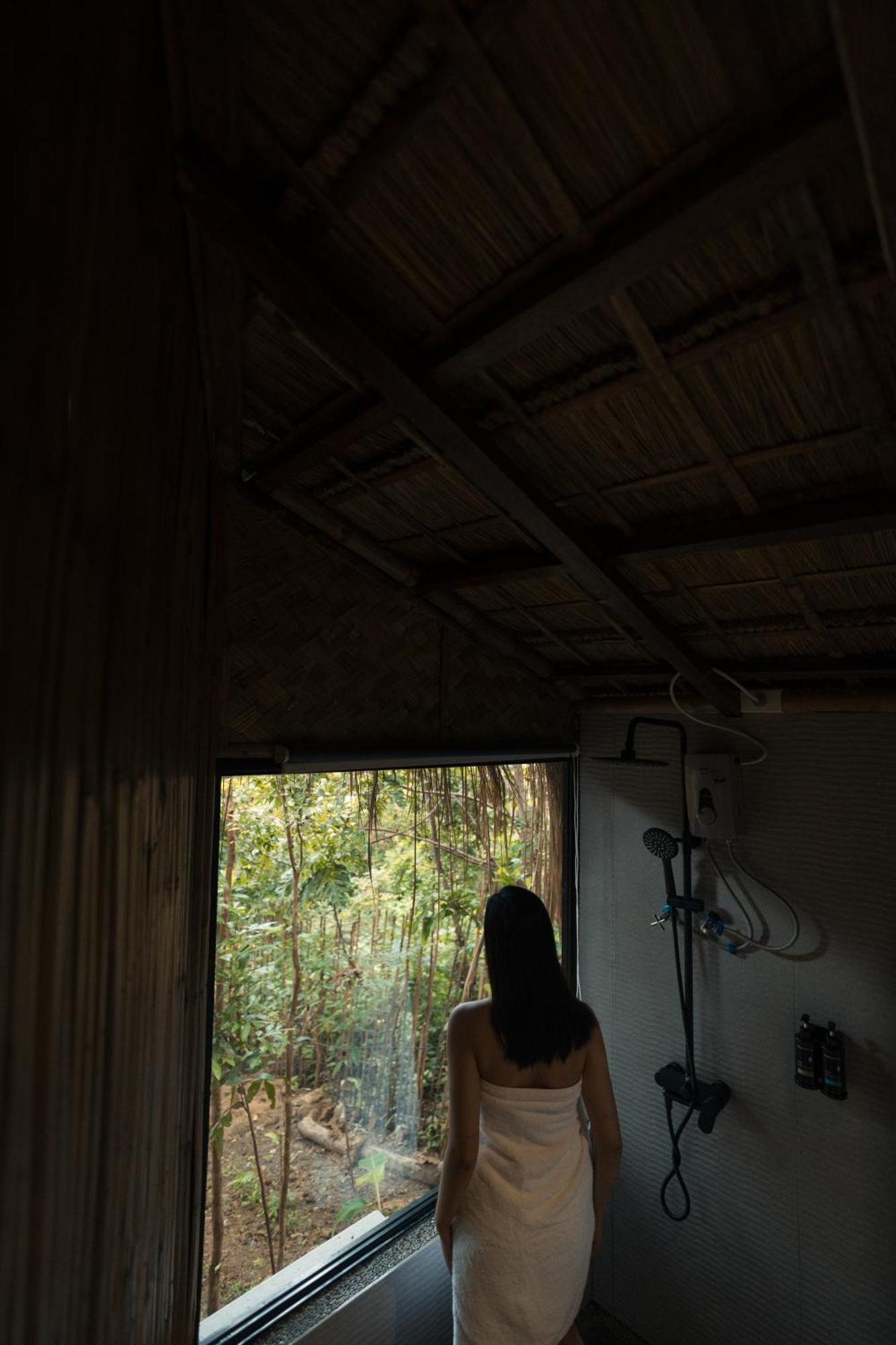 Inigtan Lio Bamboo Cottages Эль-Нидо Экстерьер фото
