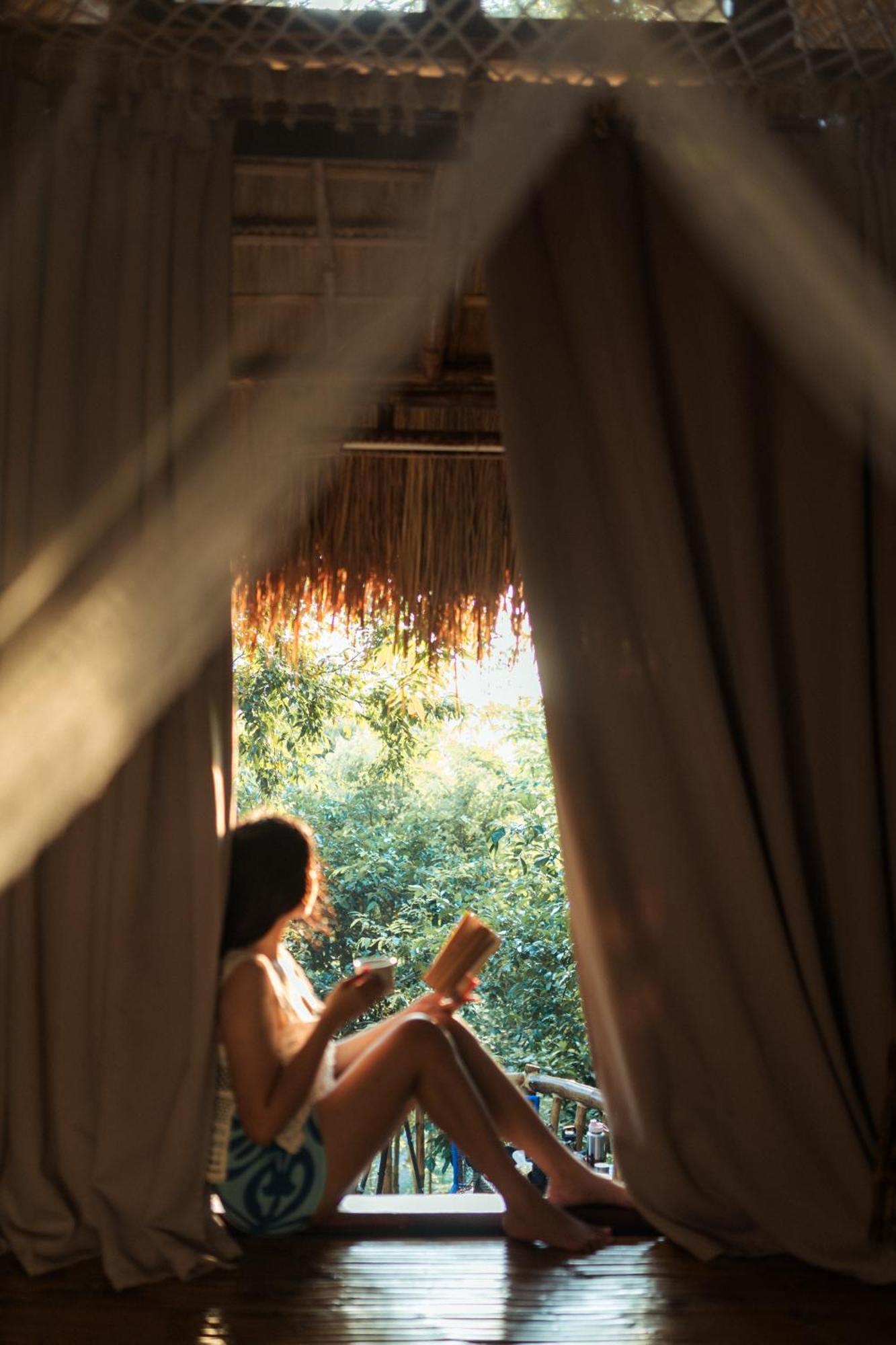 Inigtan Lio Bamboo Cottages Эль-Нидо Экстерьер фото